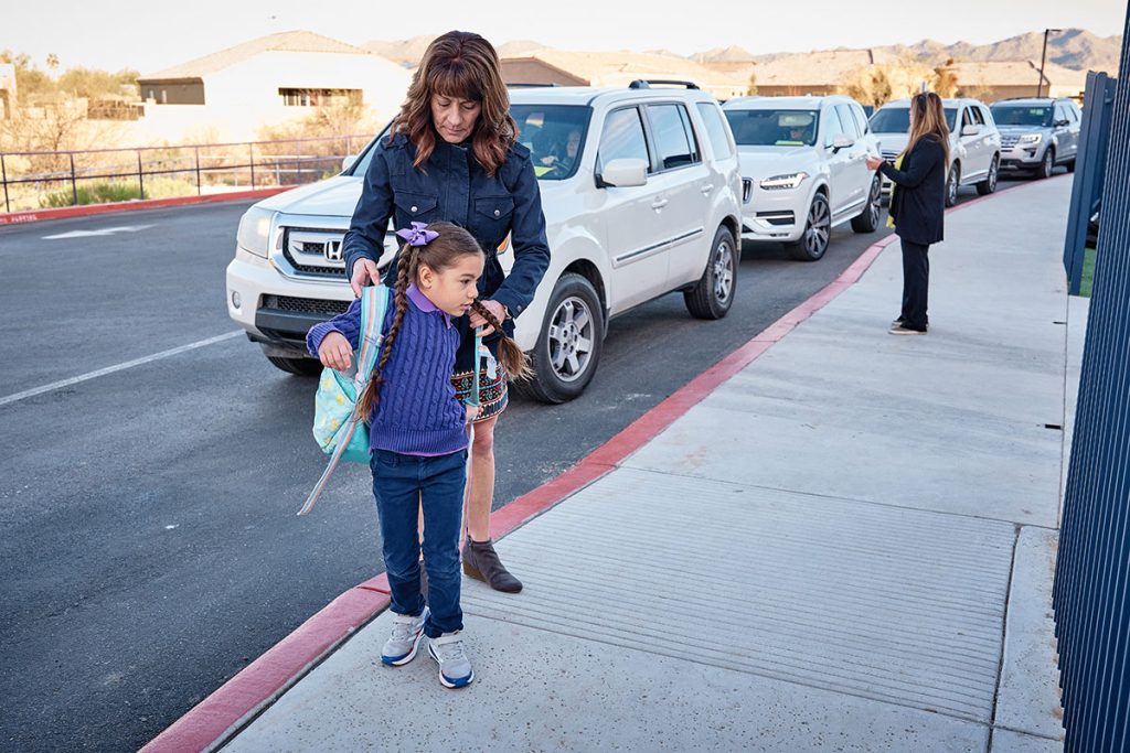 Parent dropping of scholar at Leman Academy