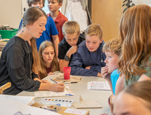 Leman Academy Teacher engaging with her Scholars