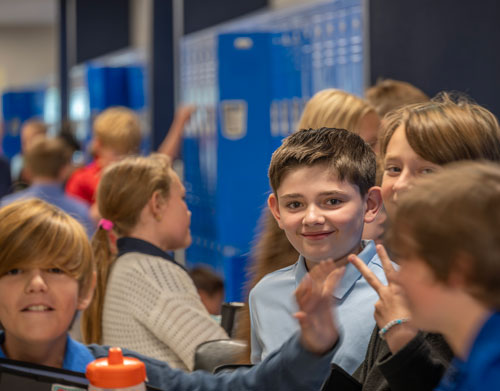 Young scholars in the hall of Leman Academy Stroh
