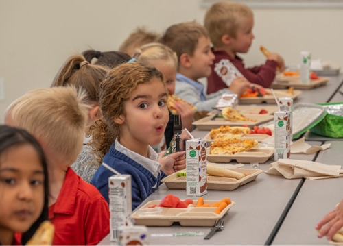 Bayou Gulch Pre-K scholars enjoying lunch, recess and rest